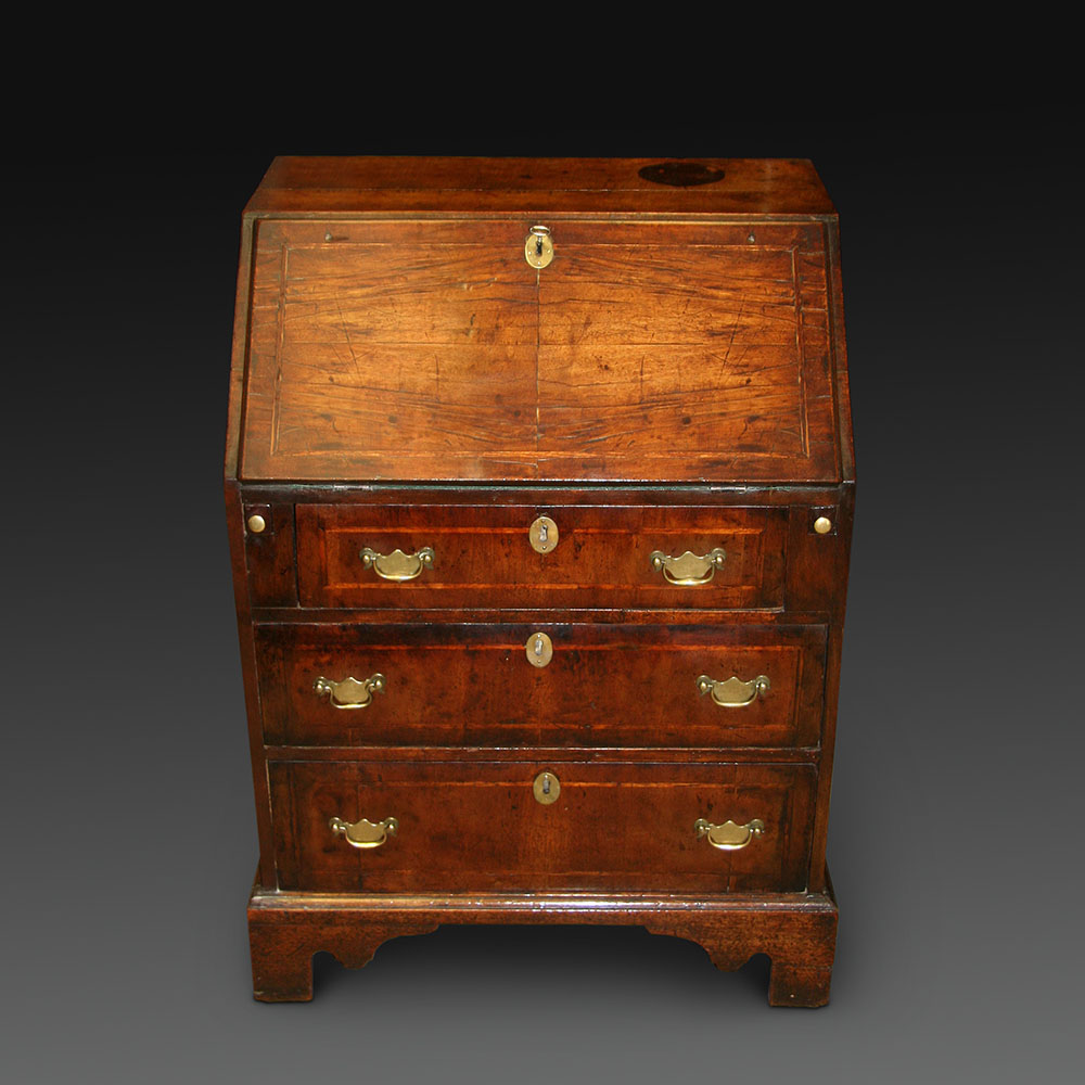 A Small Early 18th Century Walnut Bureau (1 of 1)