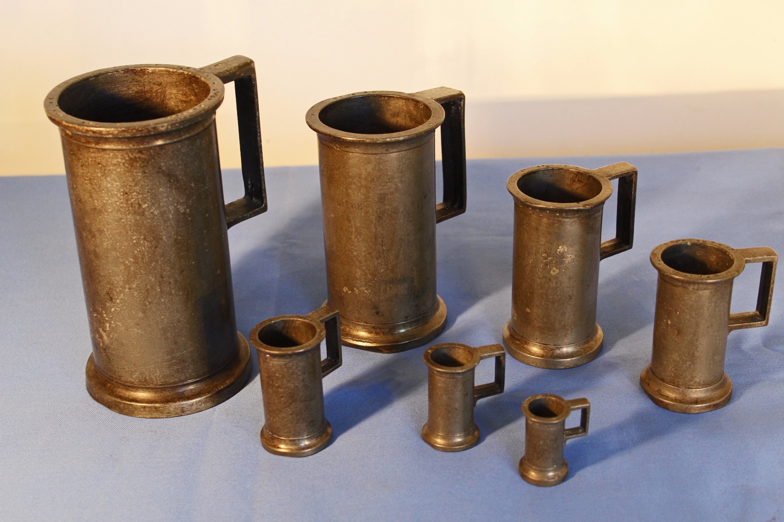 Graduated Set of 7 Antique French Pewter Measures (1 of 1) Graduated Set of 7 Antique French Pewter Measures (1 of 1)