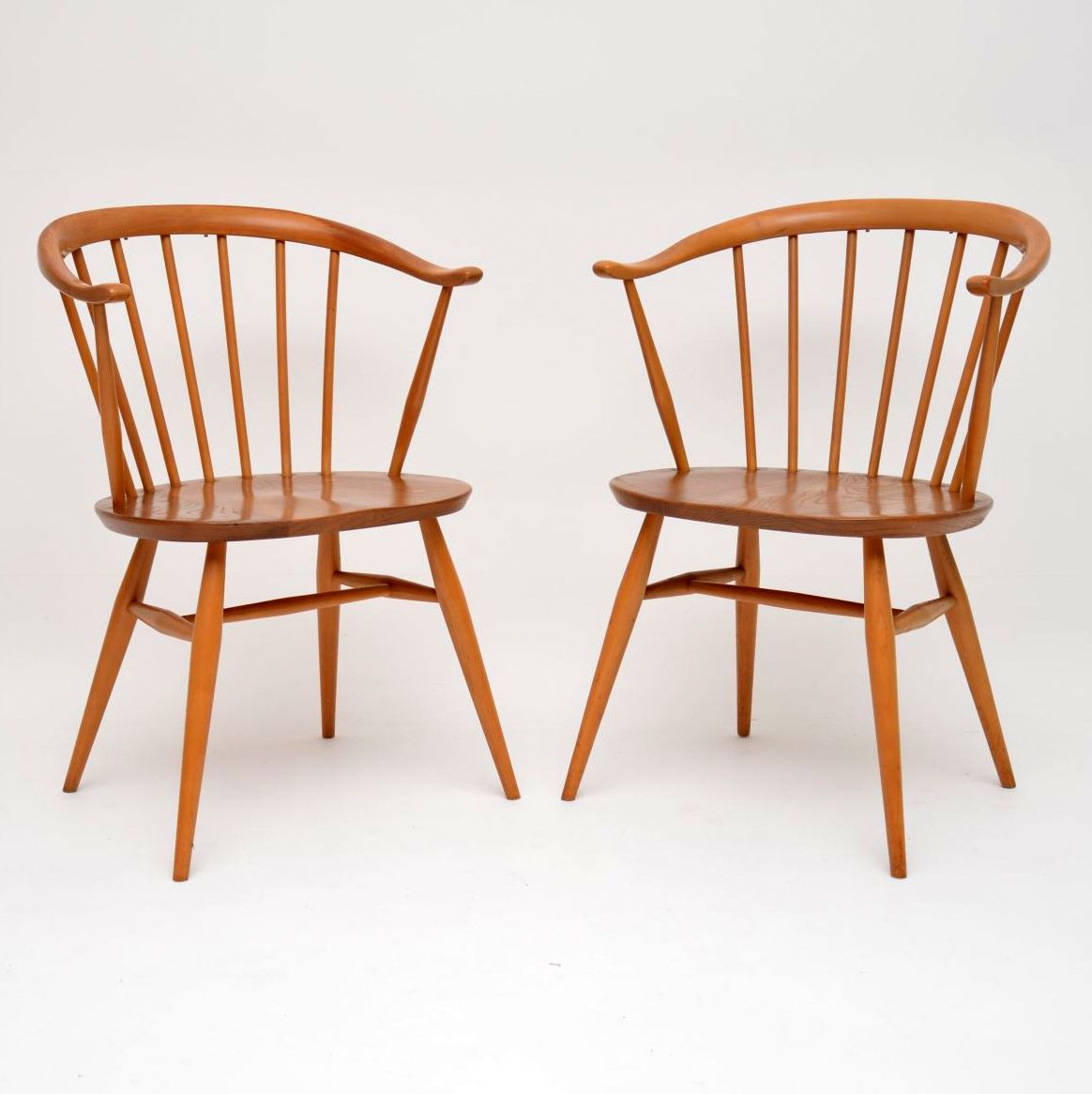1960’S Pair of Vintage Cowhorn Armchairs by Ercol (1 of 1)