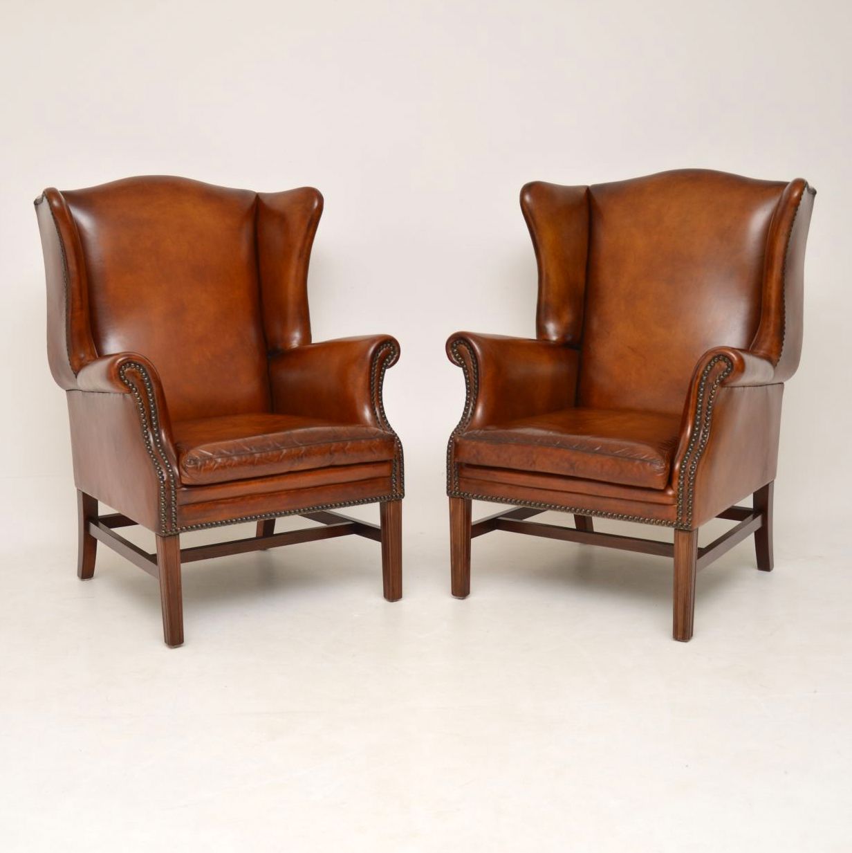 Pair of Swedish Leather Wing Back Armchairs c.1920 (1 of 1) Pair of Swedish Leather Wing Back Armchairs c.1920 (1 of 1)