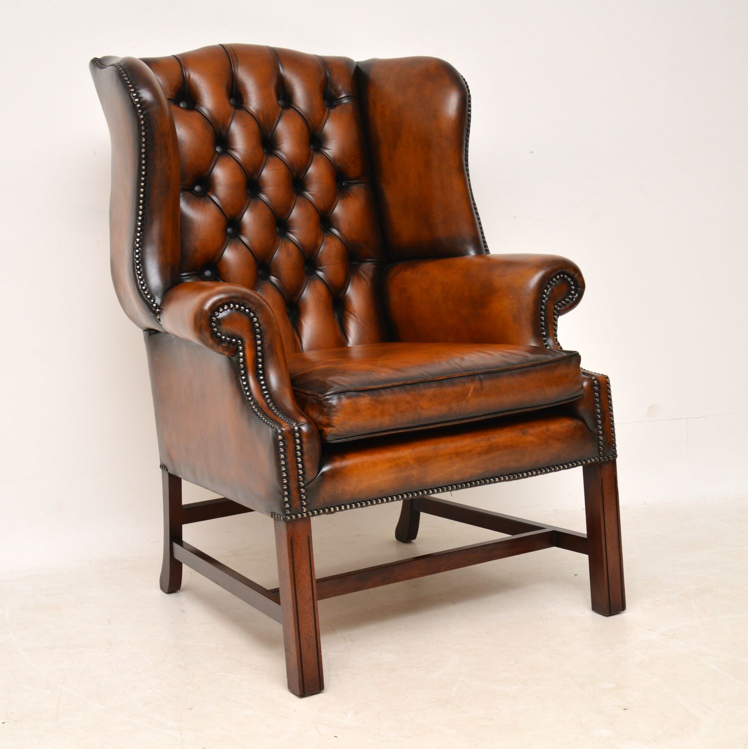 Deep Buttoned Leather Wing Back Armchair (1 of 7) Deep Buttoned Leather Wing Back Armchair (1 of 7)