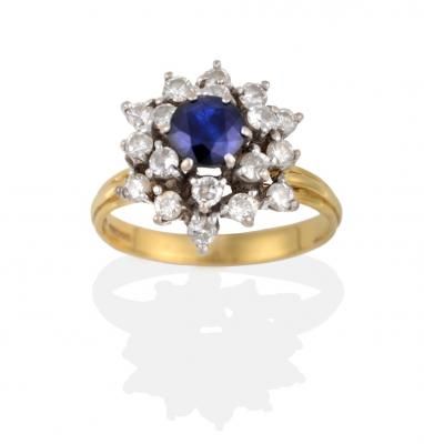 An 18 Carat Gold Sapphire and Diamond Cluster Ring (1 of 8) An 18 Carat Gold Sapphire and Diamond Cluster Ring (1 of 8)