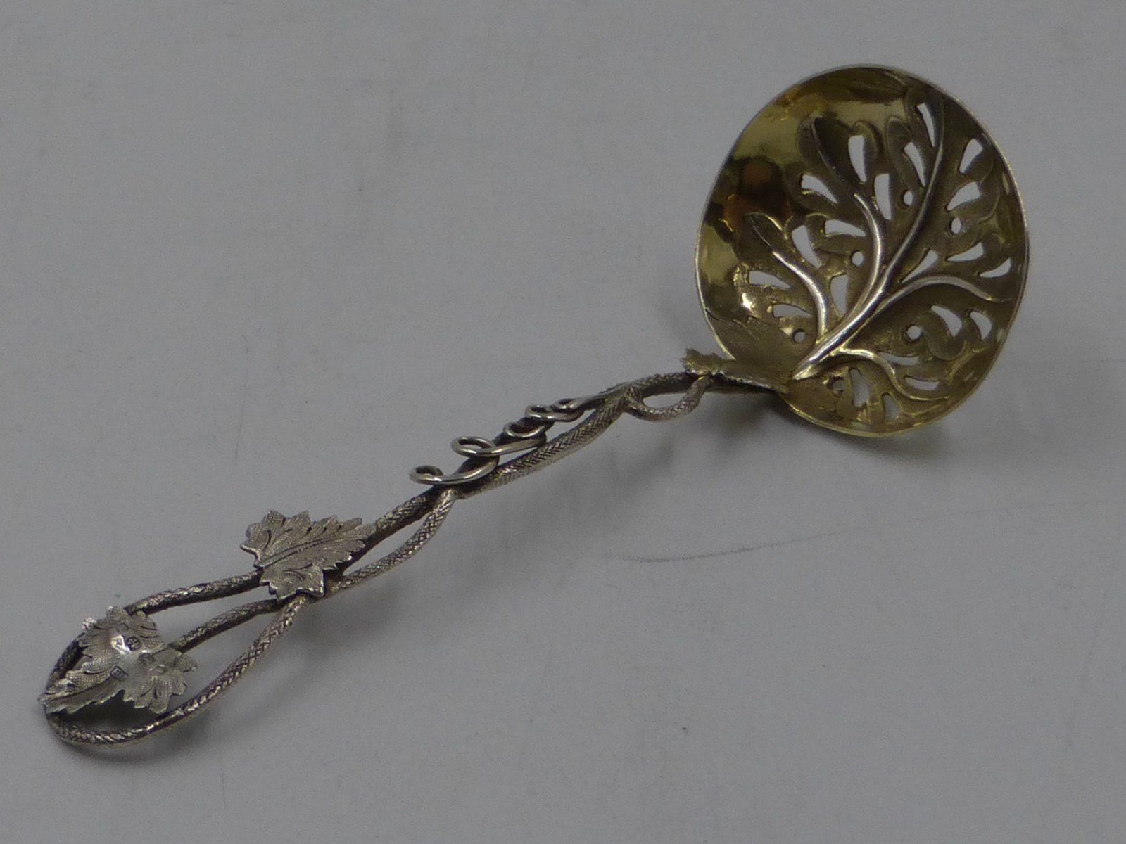 silver sugar sifter spoon