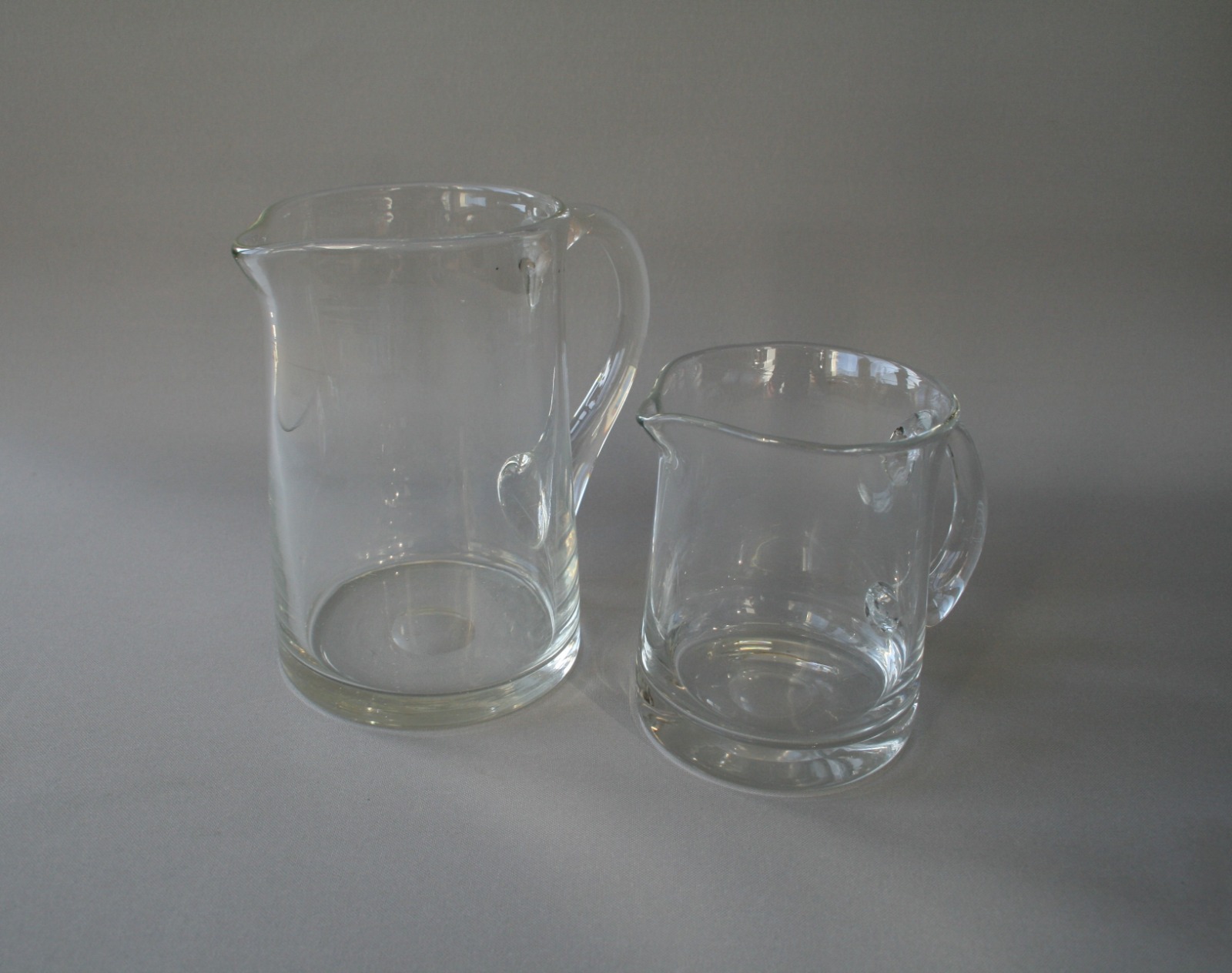 Pair of Plain Glass Jugs (1 of 2)