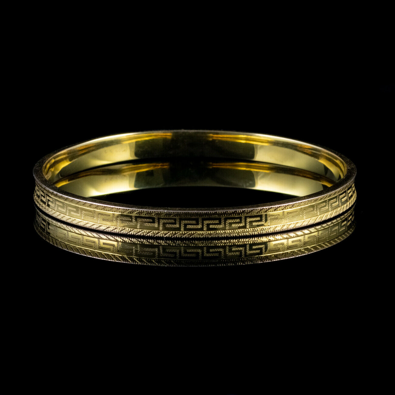 solid gold slave bangle