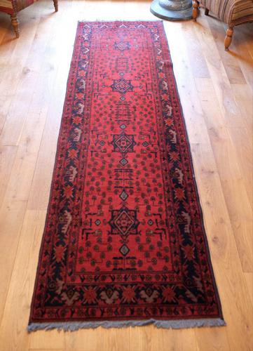 Vintage North West Persian Wool Runner with an all over design upon a red and dark blue ground within multiple borders (1 of 8)