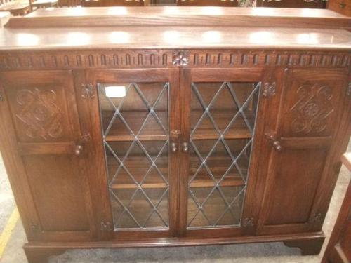 Carved Oak Bookcase with Cupboards (1 of 3)