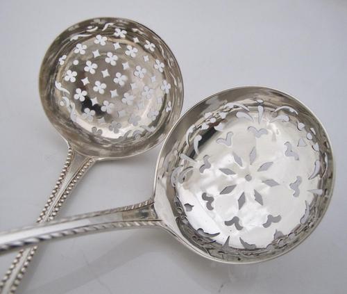 Two similar Georgian Crested Silver Sifter Spoons John Lamb London 1771 (1 of 7)