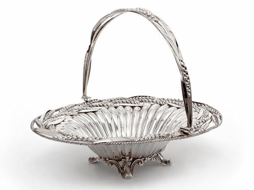 Victorian Oval Silver Plated Swing Handle Basket with Wheat and Rope Border on Four Cast Scroll Feet (1 of 5)