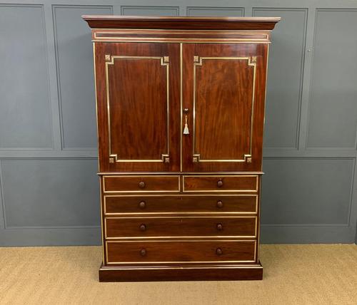 Early 19th Century Brass Mounted Flame Mahogany Linen Press (1 of 21)