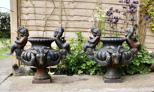 Pair of Cast Iron Garden Urns with Cherubs & Rams Heads (1 of 8) Pair of Cast Iron Garden Urns with Cherubs & Rams Heads (1 of 8)