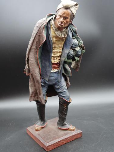 A Very Well Modelled Mid 19th Century Papier-Mâché Figure of a Fruit Seller (1 of 5) A Very Well Modelled Mid 19th Century Papier-Mâché Figure of a Fruit Seller (1 of 5)