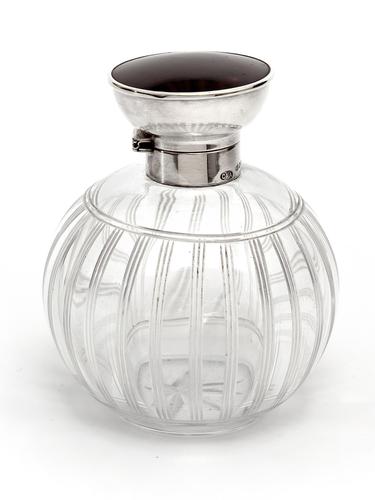 Silver Topped Perfume Bottle with a Tortoiseshell Lid and Clear Cut Glass Body (1 of 4)