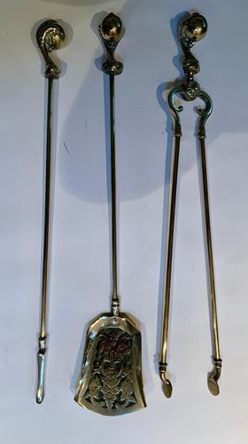 A Set of Brass Fire Irons (1 of 3)