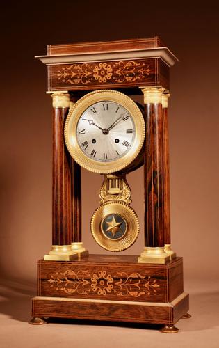 A Very Stylish Charles X Rosewood/Palisandre Inlaid With Lemon Wood and Ormolu Portico Clock Circa: 1830 (1 of 15) A Very Stylish Charles X Rosewood/Palisandre Inlaid With Lemon Wood and Ormolu Portico Clock Circa: 1830 (1 of 15)