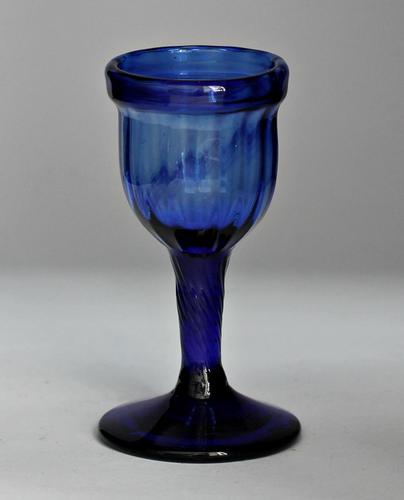 Georgian, wrythen-moulded "Bristol" blue glass egg cup (1 of 3) Georgian, wrythen-moulded "Bristol" blue glass egg cup (1 of 3)