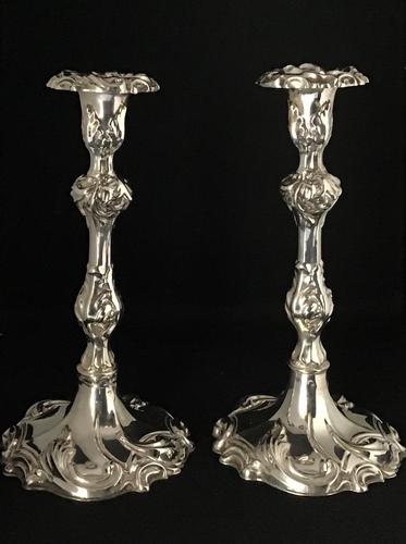 A Pair of Rococo Style Silver Plated Candlesticks. (1 of 4) A Pair of Rococo Style Silver Plated Candlesticks. (1 of 4)