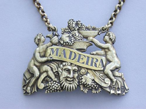 George III Cast Silver Gilt "Two Putti" Wine Label 'Madeira' (1 of 10) George III Cast Silver Gilt "Two Putti" Wine Label 'Madeira' (1 of 10)