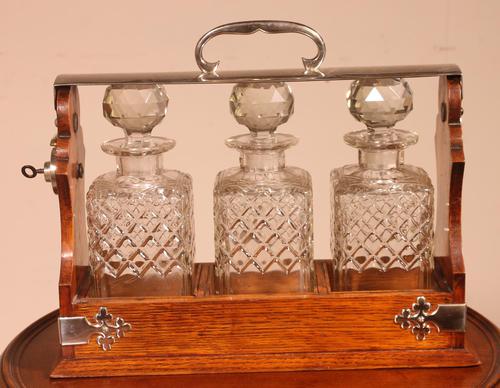 Liquor Cellar / Tantalus In Silver Metal And Oak Three Crystal Bottles - 19th Century (1 of 10) Liquor Cellar / Tantalus In Silver Metal And Oak Three Crystal Bottles - 19th Century (1 of 10)