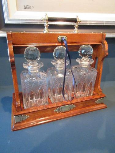 Antique Polished Oak & Ebony Three Bottle Tantalus (1 of 11) Antique Polished Oak & Ebony Three Bottle Tantalus (1 of 11)