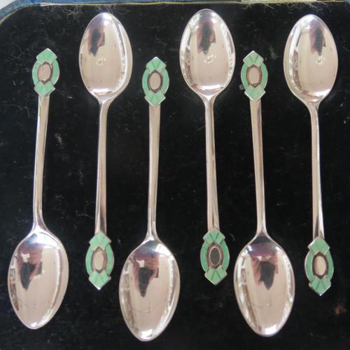 A cased set of silver, green-enamelled coffee spoons in the Art Deco manner (1 of 9) A cased set of silver, green-enamelled coffee spoons in the Art Deco manner (1 of 9)