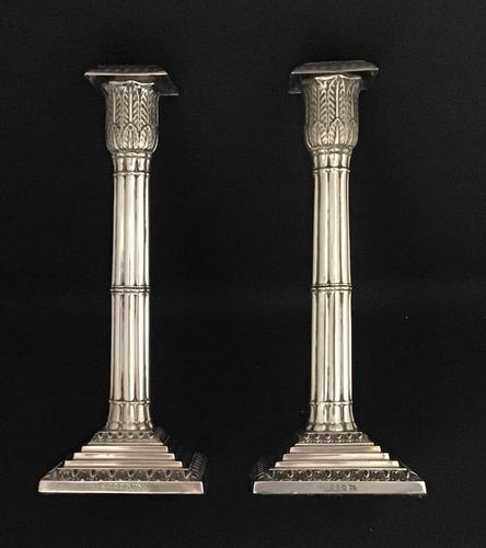 A Victorian pair of silver plated Corinthian column candlesticks (1 of 5) A Victorian pair of silver plated Corinthian column candlesticks (1 of 5)