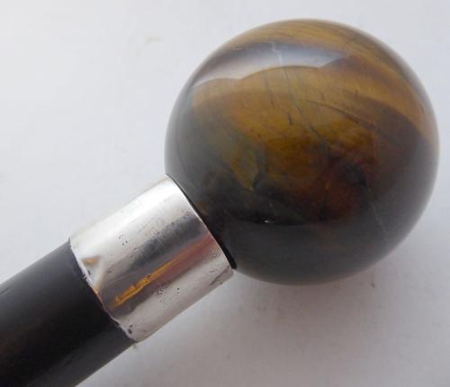 Walking Stick Cane 1923 Hallmarked Solid Silver Collar Tigers Eye Pommel Ebony (1 of 1)