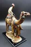 Late 19th Century Bronze Figure of Carpet Seller Astride a Camel (2 of 3) Late 19th Century Bronze Figure of Carpet Seller Astride a Camel (2 of 3)