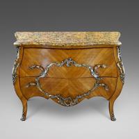 A 19th Century French Sabicu Bombe Commode