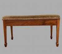 An Edwardian Duet Piano Stool with Hinged Storage