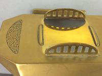 Art Deco brass and glass inkwell, the hinged brass lid above a clear glass body and brass base with two pen trays and engraved foliate scroll decoration, (4 of 12) Art Deco brass and glass inkwell, the hinged brass lid above a clear glass body and brass base with two pen trays and engraved foliate scroll decoration, (4 of 12)