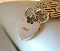 Vintage Sterling Silver Gate Bracelet 1975 Chunky Heart Padlock 7 1/2" Length 35 Grams (8 of 10) Vintage Sterling Silver Gate Bracelet 1975 Chunky Heart Padlock 7 1/2" Length 35 Grams (8 of 10)