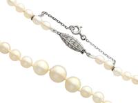 Single Strand Natural Pearl Necklace with 0.30ct Diamond Set Clasp c.1930 (5 of 12) Single Strand Natural Pearl Necklace with 0.30ct Diamond Set Clasp c.1930 (5 of 12)