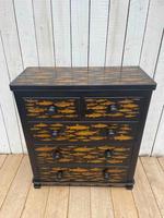 Fish on a Chest of Drawers