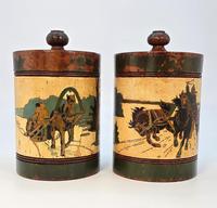 A Rare Pair of Treen Russian Tobacco Containers with Carved and Painted Decoration