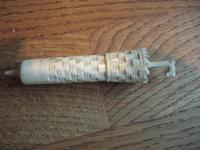 Victorian bone needle case in the shape of a parasol with castellated design (2 of 3) Victorian bone needle case in the shape of a parasol with castellated design (2 of 3)