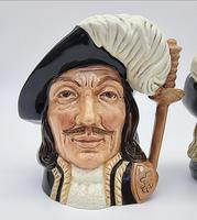 A Pair of Small Royal Doulton Musketeer Toby Jugs (3 of 9) A Pair of Small Royal Doulton Musketeer Toby Jugs (3 of 9)