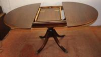 1960s Mahogany Round Table with One Leaf which Folds under Table (4 of 4) 1960s Mahogany Round Table with One Leaf which Folds under Table (4 of 4)