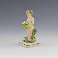 Early Staffordshire Pearlware Figure of Putto with Basket c.1800 (9 of 9) Early Staffordshire Pearlware Figure of Putto with Basket c.1800 (9 of 9)