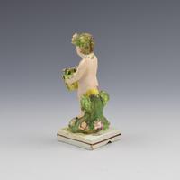 Early Staffordshire Pearlware Figure of Putto with Basket c.1800 (7 of 9) Early Staffordshire Pearlware Figure of Putto with Basket c.1800 (7 of 9)