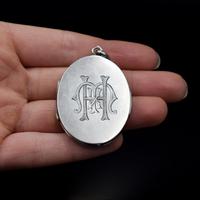 Antique Aesthetic Sterling Silver Oval Locket Pendant Initialled 'M K H' (2 of 11) Antique Aesthetic Sterling Silver Oval Locket Pendant Initialled 'M K H' (2 of 11)