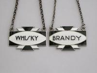 Pair of Art Deco Silver & Enamel Wine Labels 'Whisky & Brandy' by Turner & Simpson, Birmingham 1933 & 1939 (2 of 9) Pair of Art Deco Silver & Enamel Wine Labels 'Whisky & Brandy' by Turner & Simpson, Birmingham 1933 & 1939 (2 of 9)