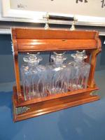 Antique Polished Oak & Ebony Three Bottle Tantalus (11 of 11) Antique Polished Oak & Ebony Three Bottle Tantalus (11 of 11)