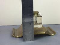 Art Deco brass and glass inkwell, the hinged brass lid above a clear glass body and brass base with two pen trays and engraved foliate scroll decoration, (7 of 12) Art Deco brass and glass inkwell, the hinged brass lid above a clear glass body and brass base with two pen trays and engraved foliate scroll decoration, (7 of 12)