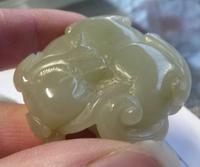 Chinese Nephrite Jade Carving of a Mythical Beast with the Flaming Pearl (4 of 5) Chinese Nephrite Jade Carving of a Mythical Beast with the Flaming Pearl (4 of 5)