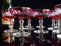 12 Cranberry Champagne Glasses in the style of Baccarat 1900-1920 (3 of 6) 12 Cranberry Champagne Glasses in the style of Baccarat 1900-1920 (3 of 6)