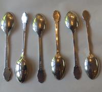 A cased set of silver, green-enamelled coffee spoons in the Art Deco manner (7 of 9) A cased set of silver, green-enamelled coffee spoons in the Art Deco manner (7 of 9)