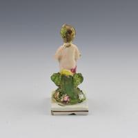 Early Staffordshire Pearlware Figure of Putto with Basket c.1800 (6 of 9) Early Staffordshire Pearlware Figure of Putto with Basket c.1800 (6 of 9)