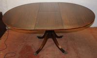 1960s Mahogany Round Table with One Leaf which Folds under Table (3 of 4) 1960s Mahogany Round Table with One Leaf which Folds under Table (3 of 4)