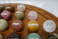 Set of French Marble Orbs on a Turned Solitaire Board (4 of 9) Set of French Marble Orbs on a Turned Solitaire Board (4 of 9)